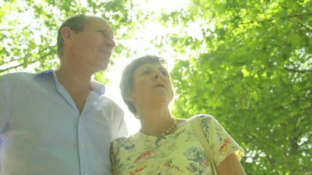 Active Senior Caucasian Tourist Couple Backlit By The Sun While On Vacation In London Themes Of Sightseeing Active Seniors Love Togetherness