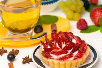 Tasty freshly baked strawberry tart with cream