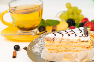 Layered biscuit cake with creamy icing