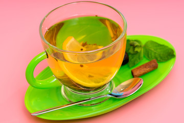 Close-up of an organic mint tea with lemon served