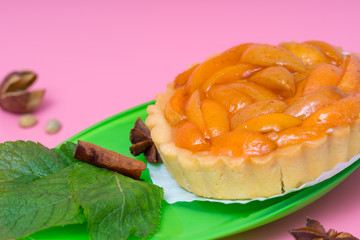 Freshly baked tart with apricots and cream