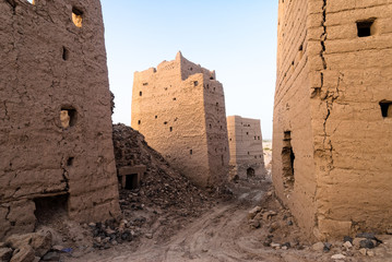Ruined multi-storey buildings made of mud in the district of Marib, Yemen