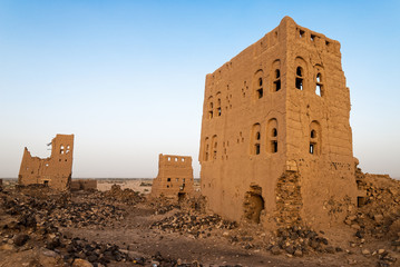 Ruined multi-storey buildings made of mud in the district of Marib, Yemen