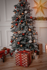 Gold Christmas background  with decorated tree