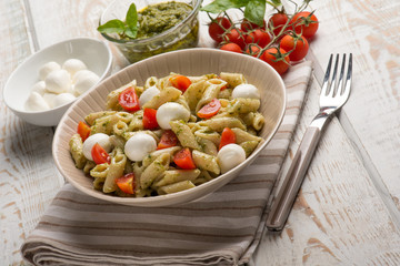 cold pasta salad with mozzarella and pesto sauce