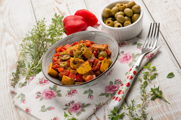 tofu  with tomatoes capsicum and green olives