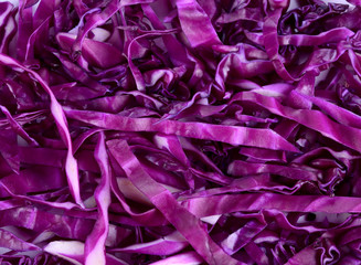 Fototapeta premium background of fresh shredded red cabbage