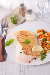 fish fillet cooked with vegetables