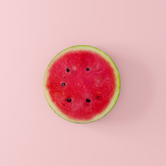 Watermelon sliced on pastel pink background. minimal concept