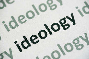 Fototapeta premium word ideology printed on paper macro