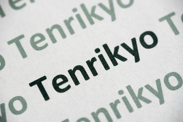 word Tenrikyo printed on paper macro