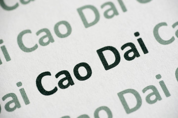 word Cao Dai printed on paper macro