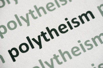 word polytheism printed on paper macro