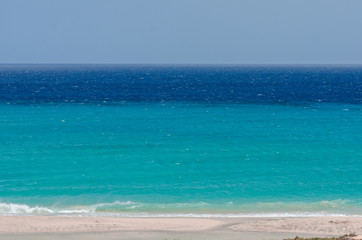 Fototapeta na wymiar Ocean landscape. blue ocean and sand beach