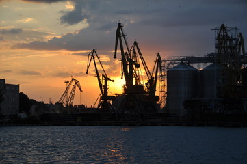 Fototapeta na wymiar cargo port at sunset