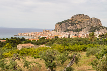 Fototapeta na wymiar View of the city of Cefalu, its basilica and its rock