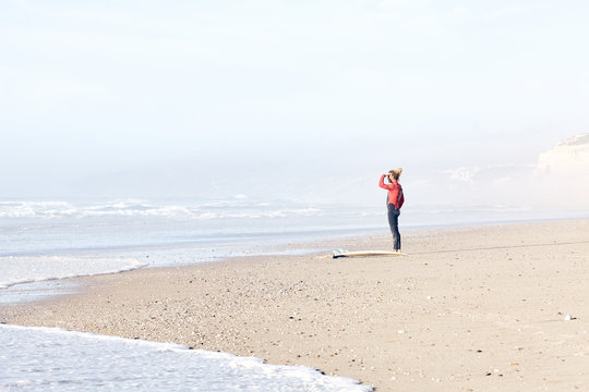 Surfer looking for waves