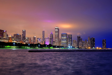 Fototapeta na wymiar Chicago, Illinois, USA - June 22, 2018 - The Chicago skyline at night after a storm across Lake Michigan.