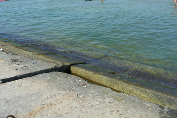 Marine breakwaters made of reinforced concrete slabs on the shore of the Black Sea