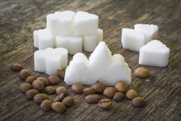 abstract: people energy - sugar figure and coffee beans