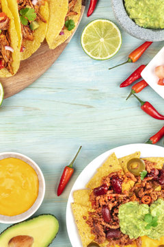 Overhead photo of an assortment of Mexican food with copyspace