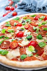 Sausage Pizza with Ham and tomatoes