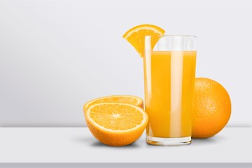 Glass of delicious orange juice on natural