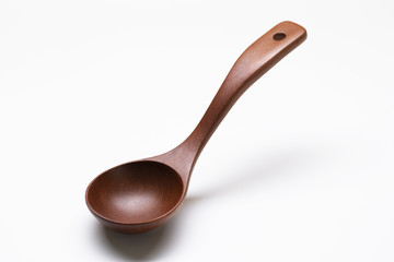 wooden spoons on white background