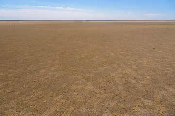 Drying lake against the background of the blue sky of Crimea