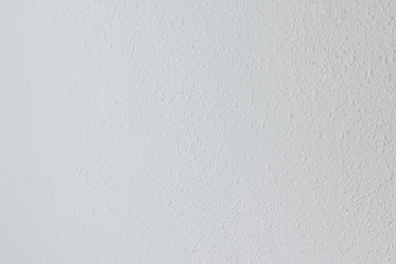 White rough pimply wall. White texture