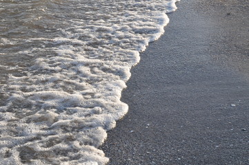  sea ​​surf at sunset. background, texture