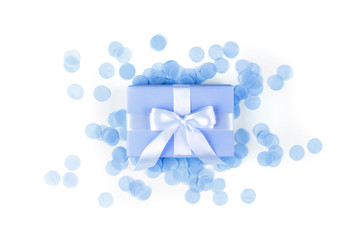 Present box with blue, bow on white background.