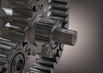 Silvery planetary gear on a gray