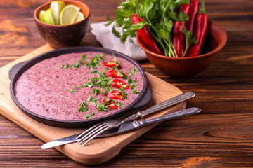 Mexican red bean puree soup with lime, parsley and chilli pepper.