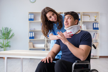 Man with neck injury visiting doctor for check-up