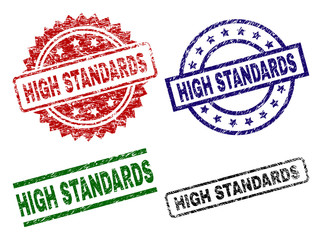 HIGH STANDARDS seal prints with corroded style. Black, green,red,blue vector rubber prints of HIGH STANDARDS title with scratched style. Rubber seals with round, rectangle, medal shapes.