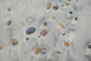 Geschliffene Steine am Strand