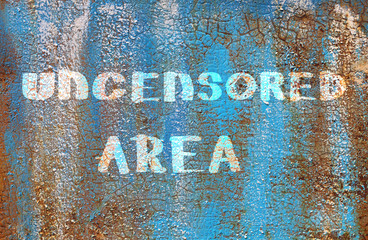 Words uncensored area on the old wall