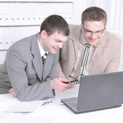 employee of the company discussing financial documents