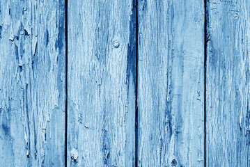Old grunge wooden fence pattern in navy blue tone.