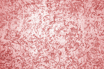 Cement wall texture in red tone.