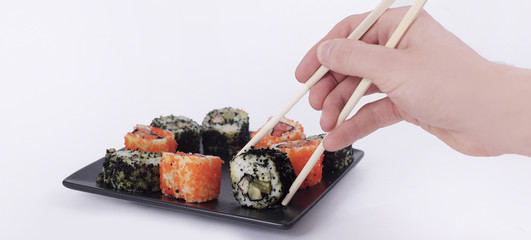 Sushi Set - different types of Maki sushi and chopsticks