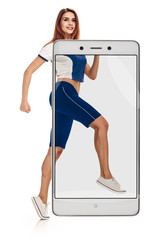 Running fit fitness sport model jogging smiling happy isolated on white background. Caucasian fitness girl training. full length. conceptual collage with device