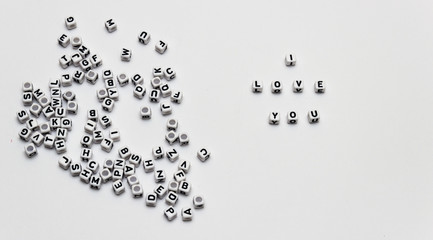 Message I love you spelled in  dice with copy space