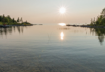 Fototapeta na wymiar Beautiful calm sunset on the Lake Huron Shoreline Water Landscape