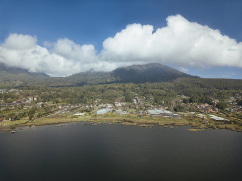 Aerial view of river by landscape against cloudy sky