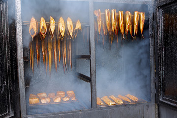 Golden smoked fish in a smokehouse