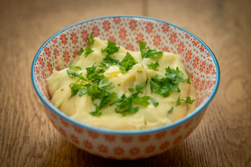 Mashed potatoes with parsley and melted butter. Food for children