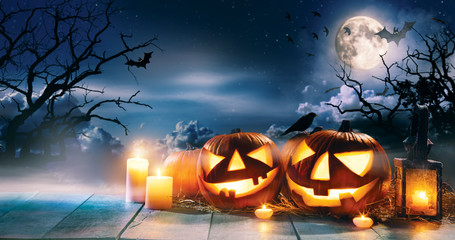 Scary horror background with halloween pumpkins jack o lantern
