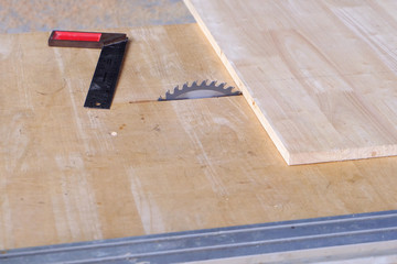 Woodworking equipment, work on wood plank in workshop